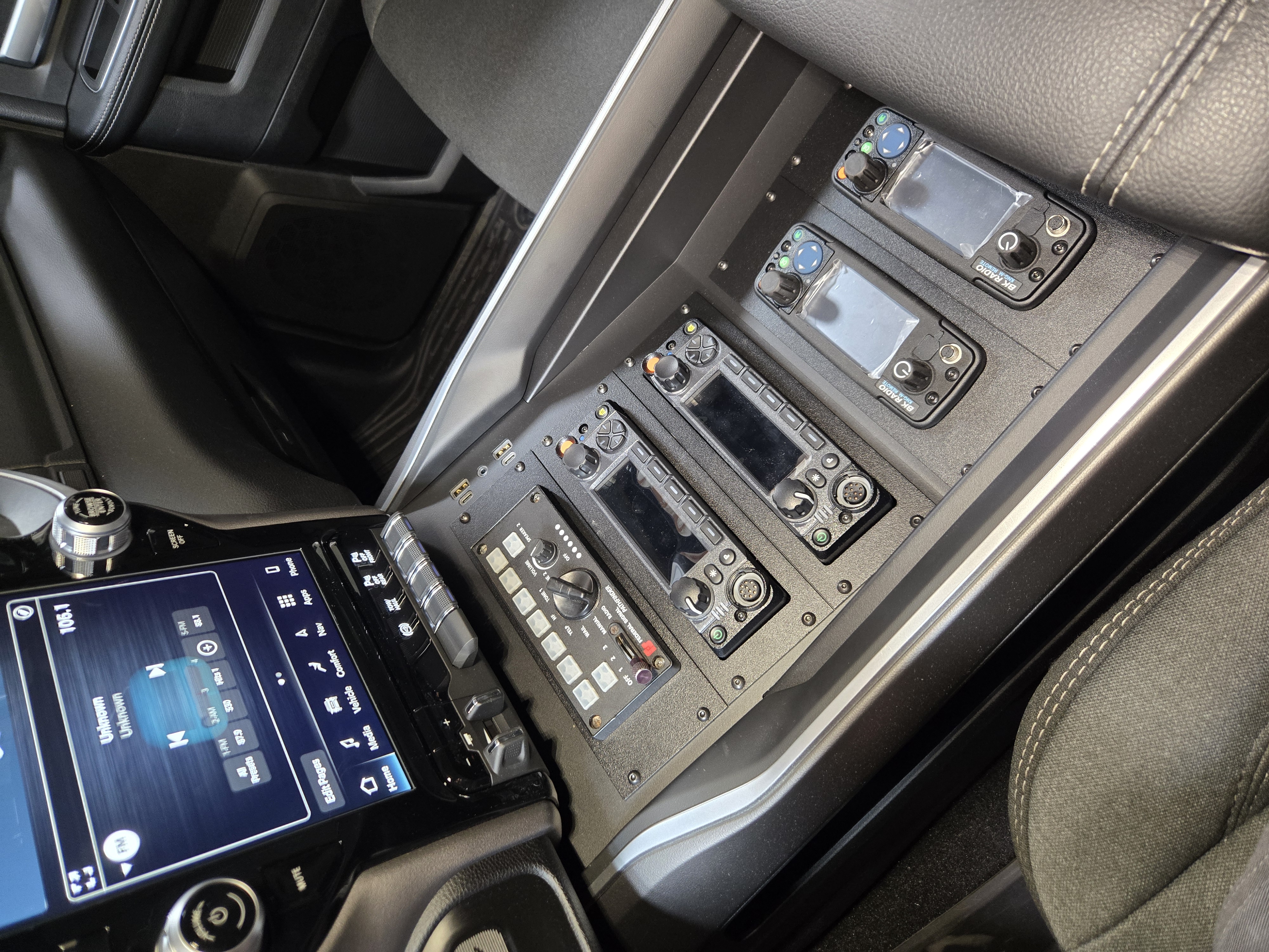 Finished custom center console with radio and control equipment integrated